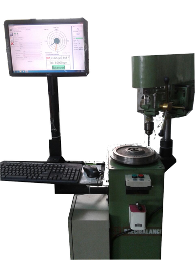 vertical balancing machine with drill head